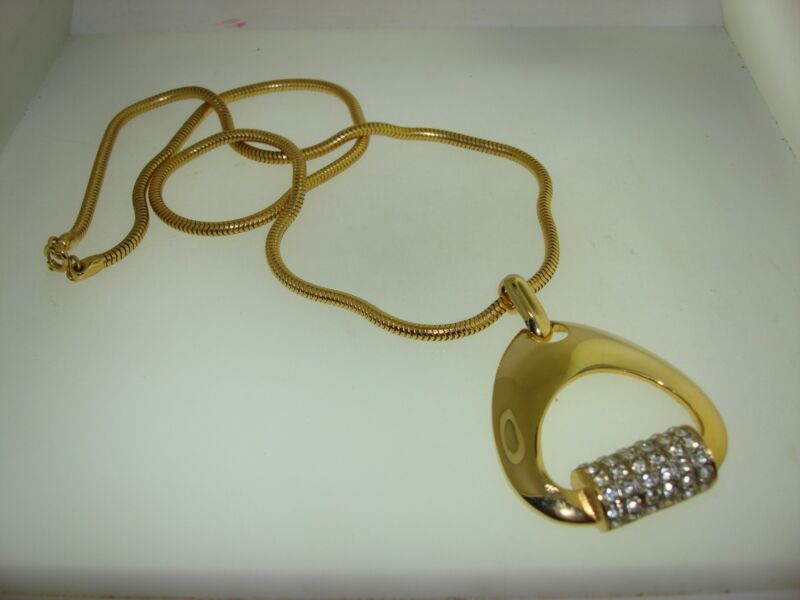 Vintage 1980s gold-tone snake chain necklace with rhinestone pendant