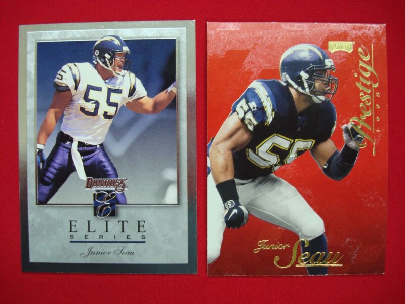 Two Junior Seau football cards: a 1998 Playoff Prestige - Red #156 and a 1996 Donruss Elite #5 serial numbered 00801/10,000.