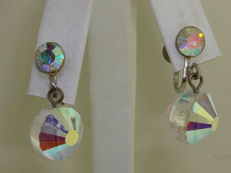 Vintage 1970s AB crystal dangle earrings with iridescent screw back closure