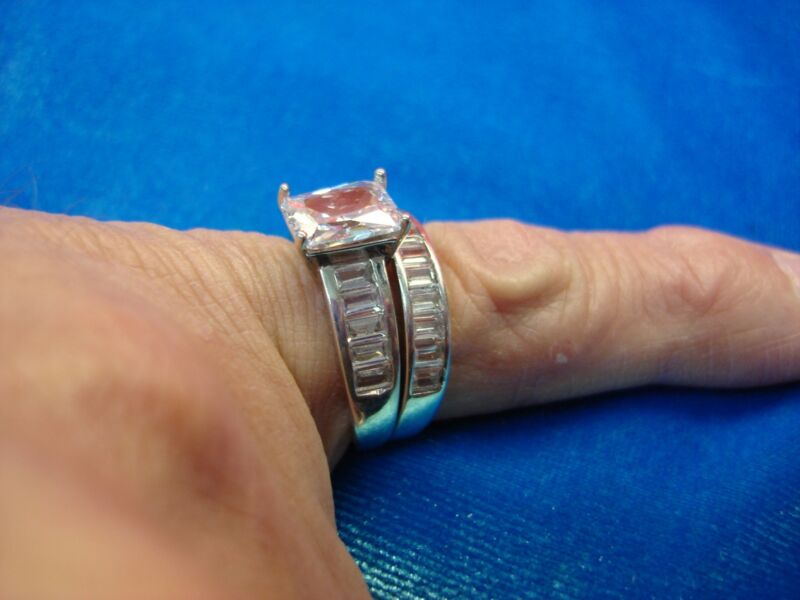 Sparkling sterling silver ring set with emerald cut CZ - size 8