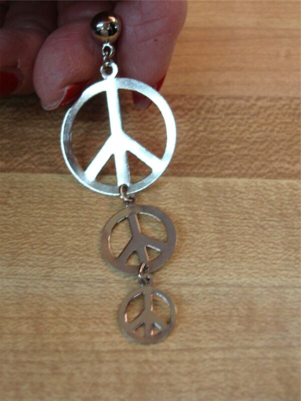 Vintage 1960s silver peace sign dangle earring