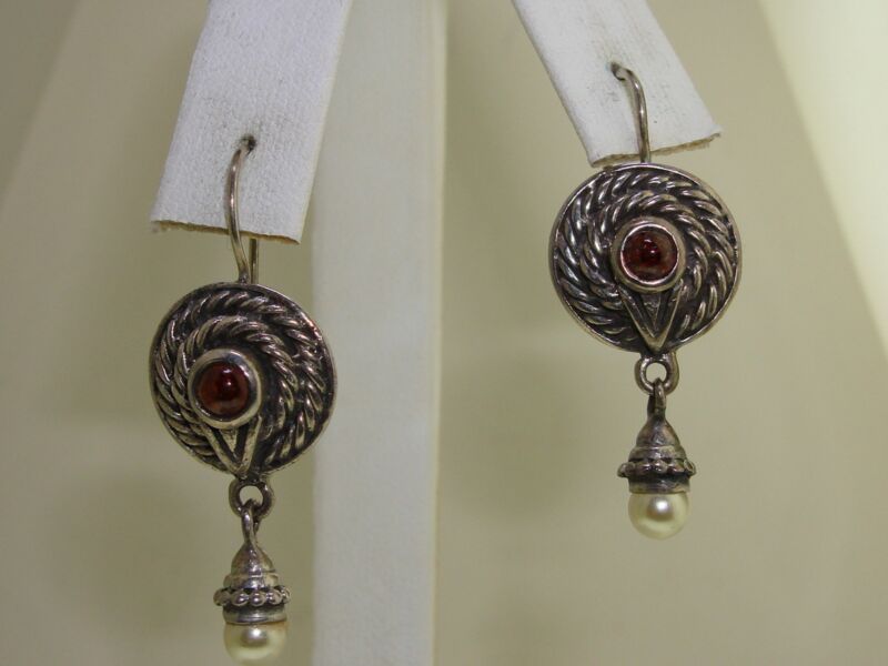 Sterling silver dangle earrings with amber and pearl accents