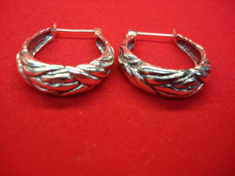 Solid sterling silver fancy hoop earrings, pre-owned in excellent condition.