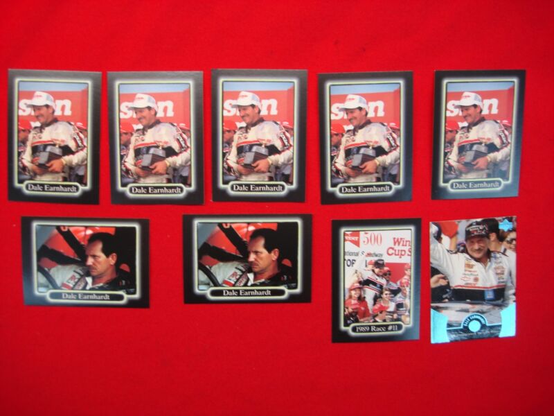 Collection of nine Dale Earnhardt trading cards from the 1990 Maxx Race and 1999 Upper Deck NASCAR series