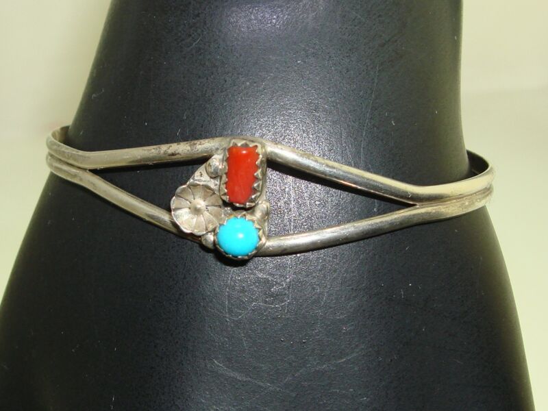 Vintage Native American sterling silver cuff bracelet with coral and turquoise floral design