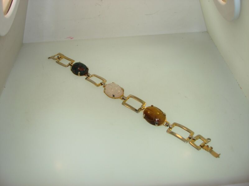 Vintage 1960s scarab bracelet with bloodstone, tiger's eye, and quartz stones.