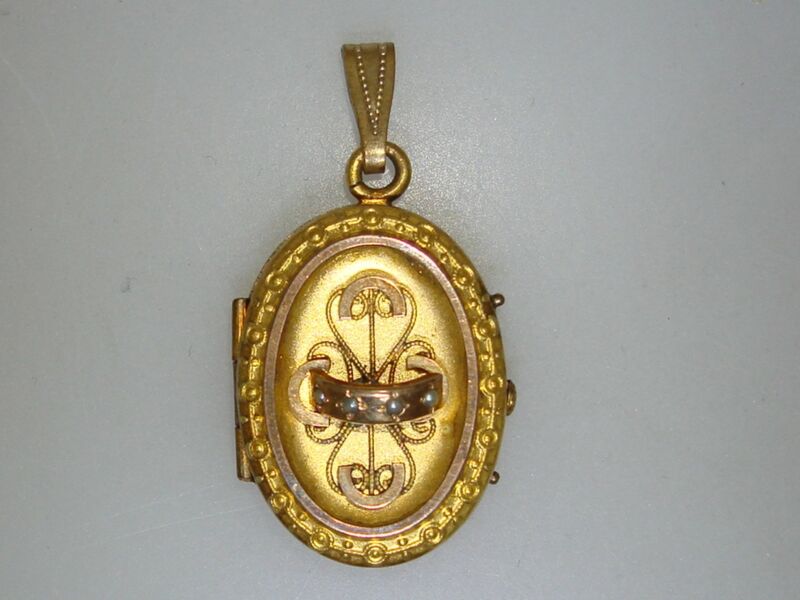 Victorian Etruscan gold-washed seed pearl locket, signed W?&B*, holds mementos