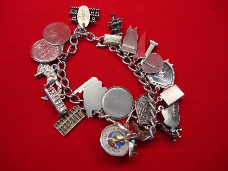 Vintage sterling silver charm bracelet with USA travel charms