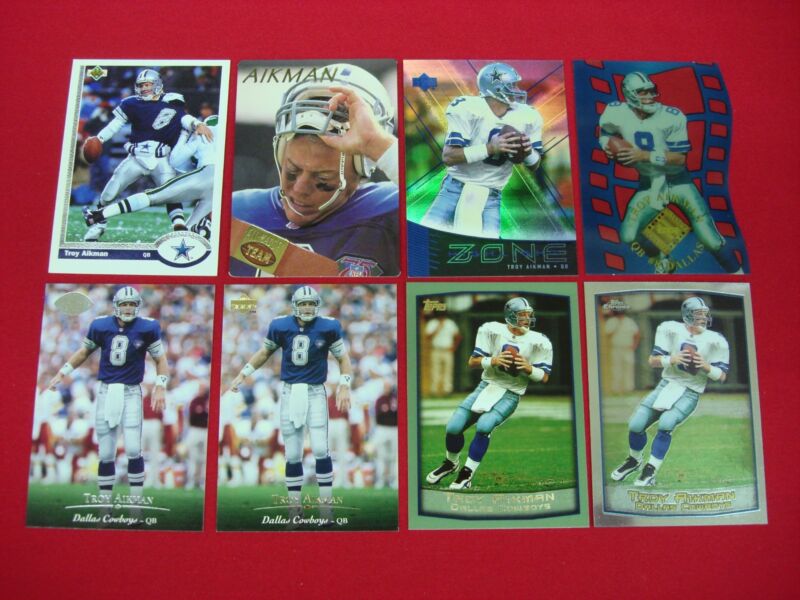 Vintage Troy Aikman Dallas Cowboys football card lot featuring parallels, inserts, and an acetate card.