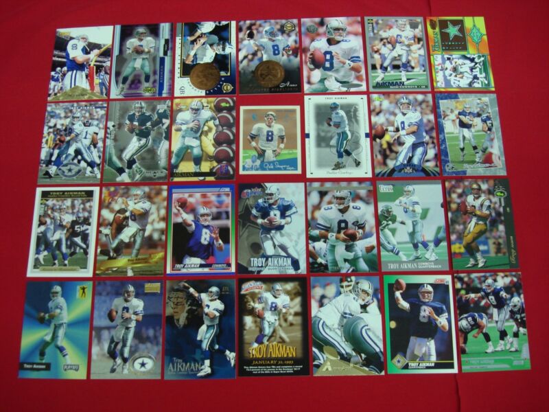 Collection of 28 Troy Aikman Dallas Cowboys football cards, including premiums, parallels, inserts, and foils.