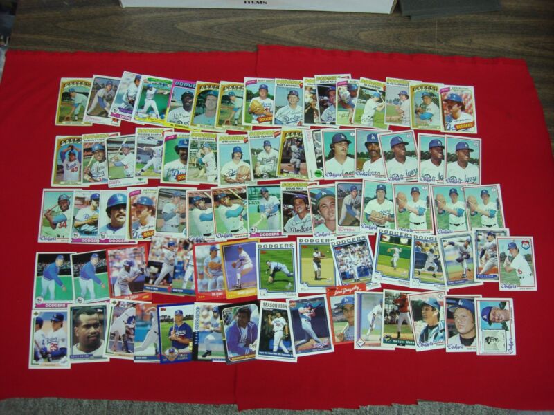 Vintage Los Angeles Dodgers baseball cards from the 1970s to 2000s, featuring iconic players.