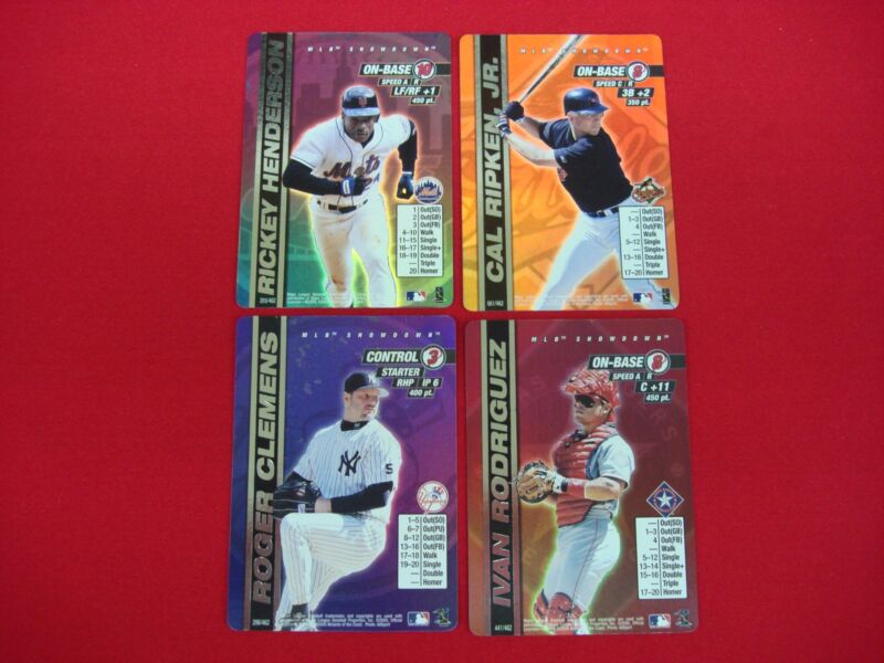 Set of four (4) graded condition 2000 Showdown baseball cards featuring Cal Ripken and Roger Clemens.