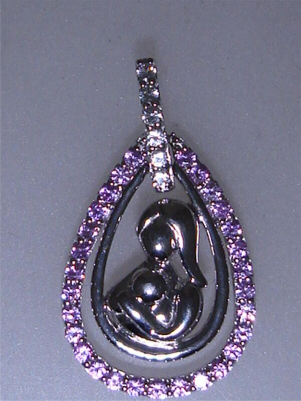 Sterling silver mother and child pendant with pink and clear topaz accents