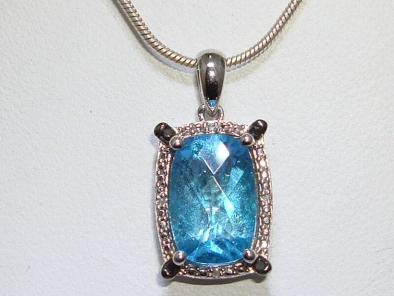 Sterling silver topaz and diamond pendant necklace