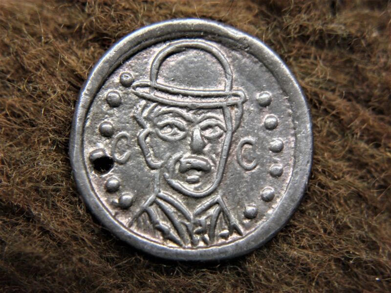 Rare Charlie Chaplin token with a baseball on the reverse