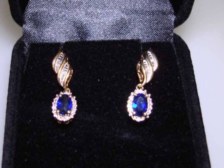 Sterling silver blue topaz and diamond dangle earrings