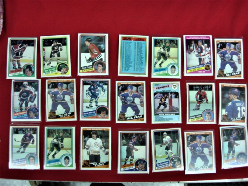 Collection of 21 hockey cards from the 1984-85 O-Pee-Chee (OPC) set, featuring star players.