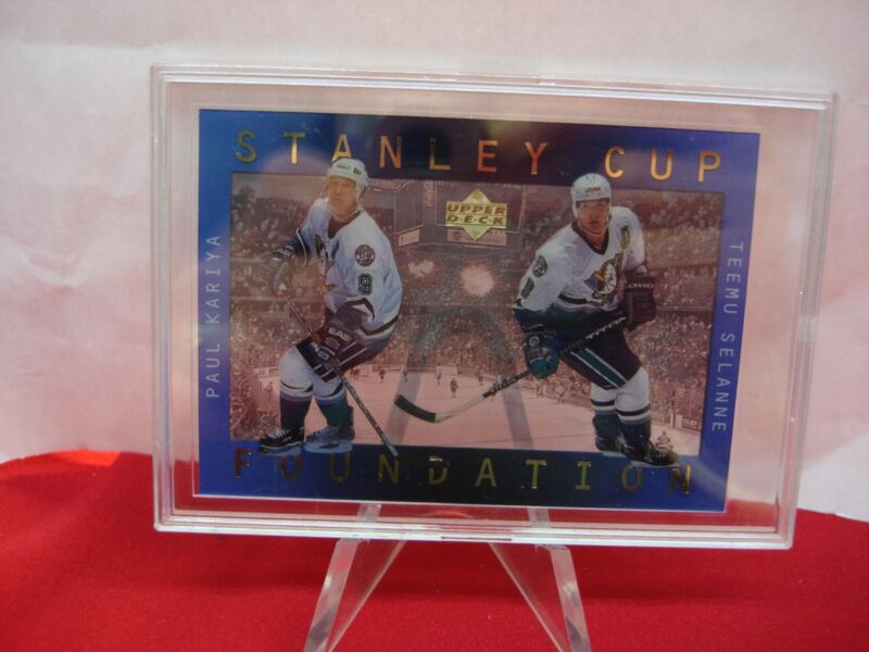 1997 Upper Deck Stanley Cup Foundation hologram card featuring Paul Kariya and Teemu Selanne rookie cards