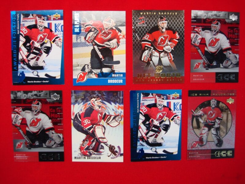 Collection of eight Martin Brodeur trading cards, including inserts