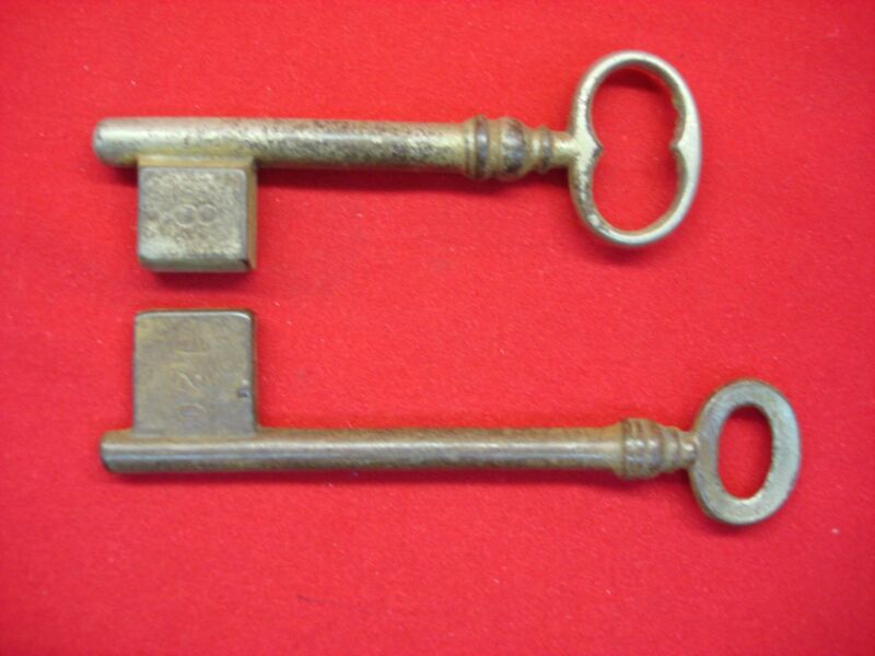 Pair of vintage jail cell keys with unique patina and stamped numbers