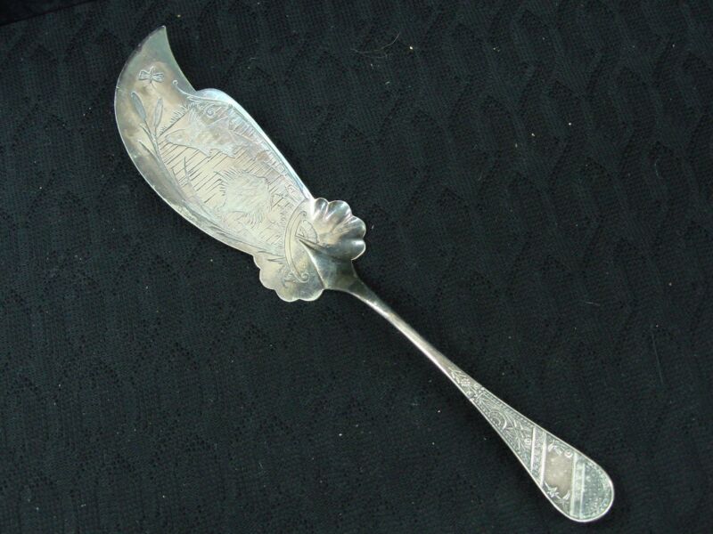 Antique Reed & Barton silverplate fish server, featuring ornate cattail and butterfly design