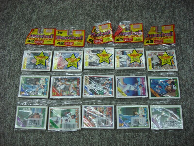 Five (5) factory sealed 1988 Topps Baseball Rack Packs. Includes iconic players like Cal Ripken Jr., Steve Carlton, Kevin Mitchell, Lance Carter, and Darryl Strawberry.