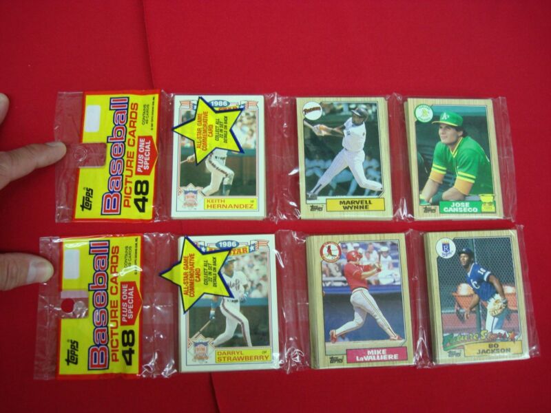 Two factory-sealed 1987 Topps Baseball Rack Packs, one with Bo Jackson's rookie card and the other with Jose Canseco's second-year card