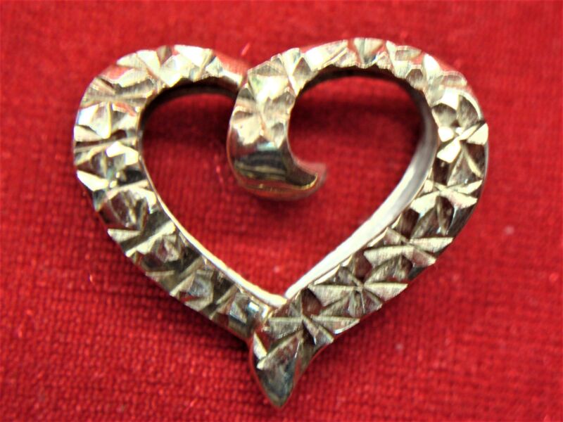 10K reversible heart slide pendant in yellow and white gold