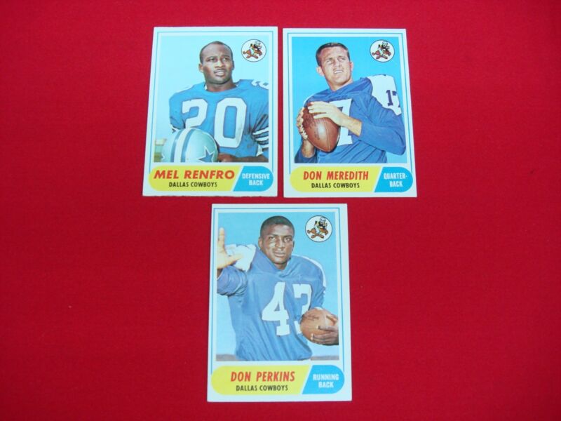 Vintage 1968 Topps Dallas Cowboys football card lot featuring Mel Renfro, Don Perkins, and Don Meredith.