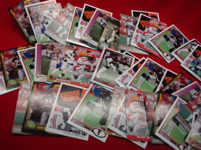 Vintage Deion Sanders Atlanta Falcons baseball cards from 1991, lot of 40+