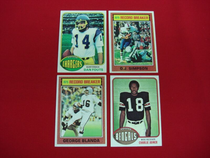 Four (4) 1976 Topps Football Cards: O.J. Simpson, Dan Fouts, George Blanda & Charlie Joiner