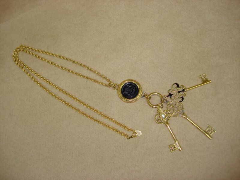 Vintage signed Joan Rivers gold-tone chain necklace with key pendant