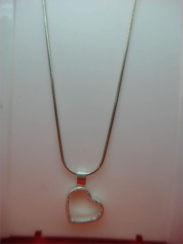 Sterling silver snake chain necklace with sliding heart pendant