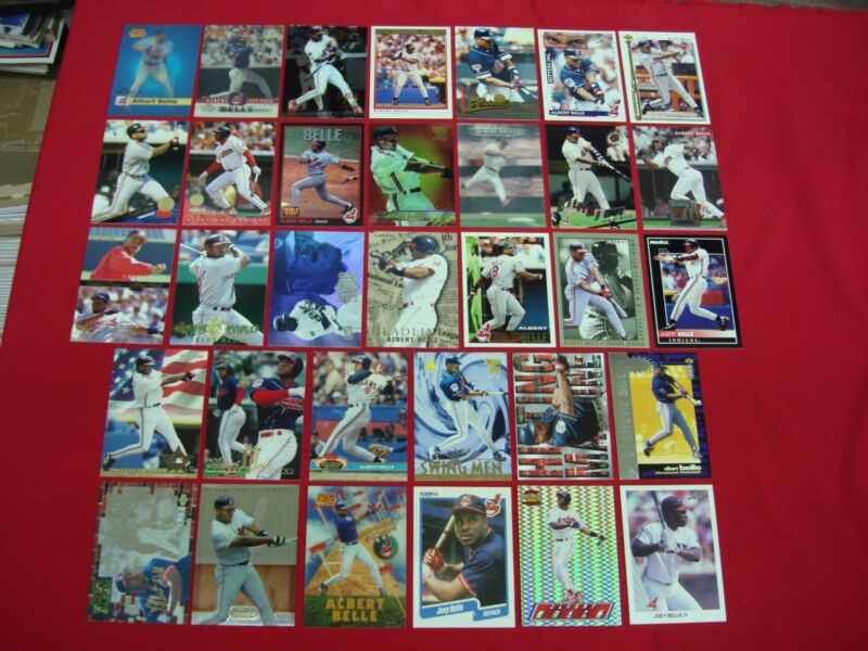 Collection of 33 Albert Belle baseball cards, including premiums and inserts.