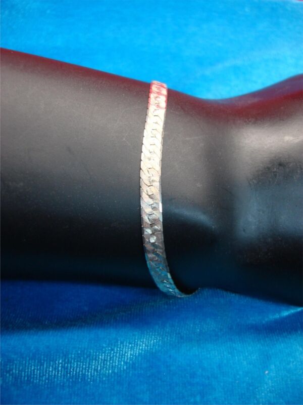 Vintage Milor sterling silver reversible bracelet with herringbone and fancy patterns