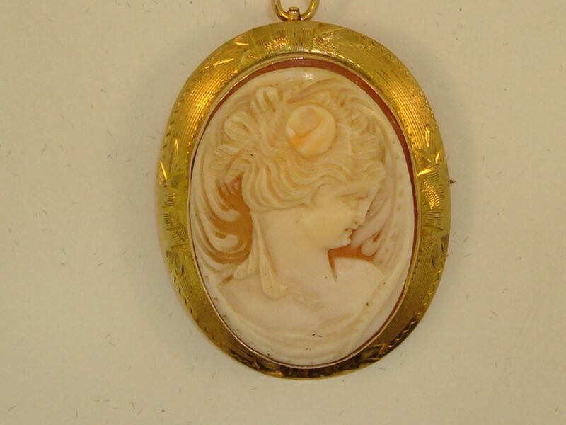 Antique 10K gold carved shell cameo pin or pendant featuring a Victorian lady