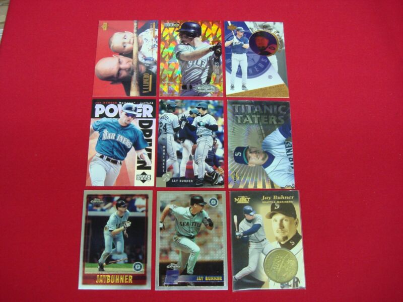 Jay Buhner baseball card lot, including a 1997 Pinnacle Mint card with a coin