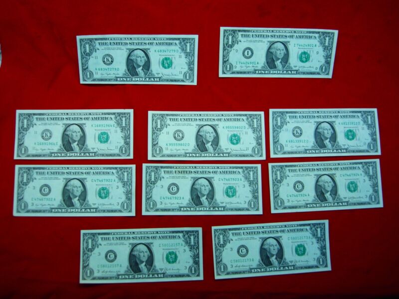 Ten (10) US $1 Federal Reserve Notes from Series 1969 & 1977, mostly uncirculated