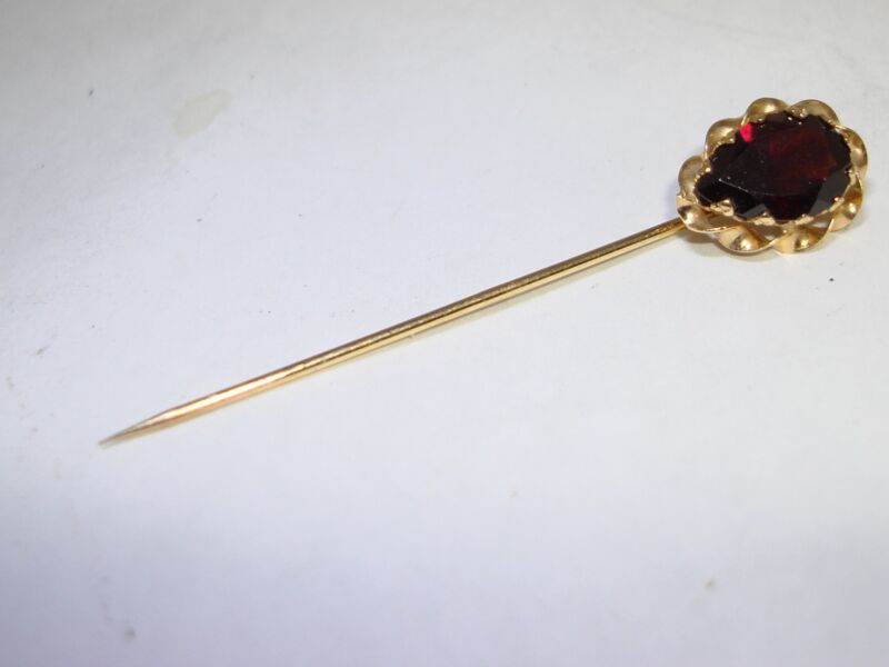 Vintage 14K gold garnet stick pin with a 1.3 carat pear-shaped stone