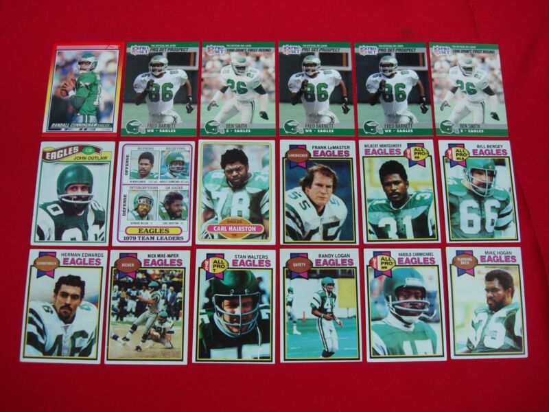 Vintage Philadelphia Eagles football card lot featuring Randall Cunningham, Harold Carmichael, Wilbert Montgomery, Carl Hairston, and Bill Bergey.