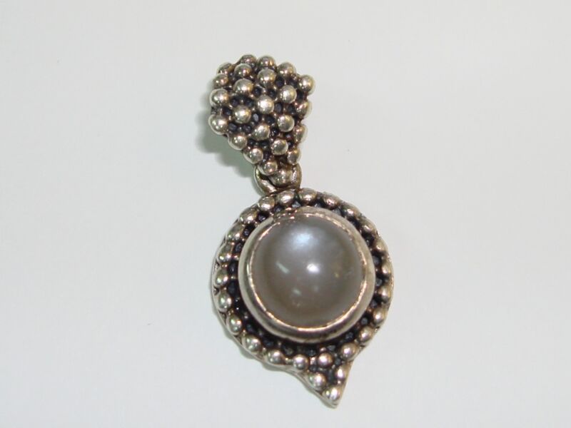 Vintage sterling silver moonstone pendant with bezel setting