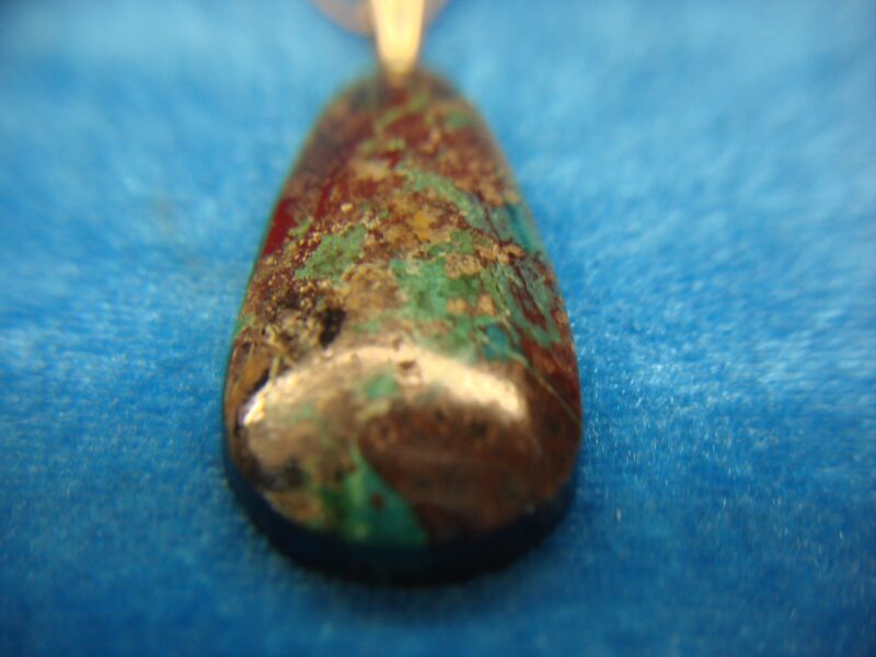 Sterling silver necklace with a multicolor stone pendant