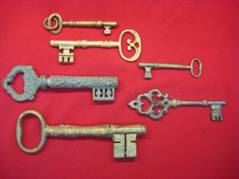 Vintage skeleton key set of six, decorative and unique with a corkscrew.