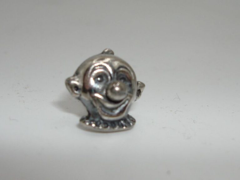Vintage silver clown face lapel pin