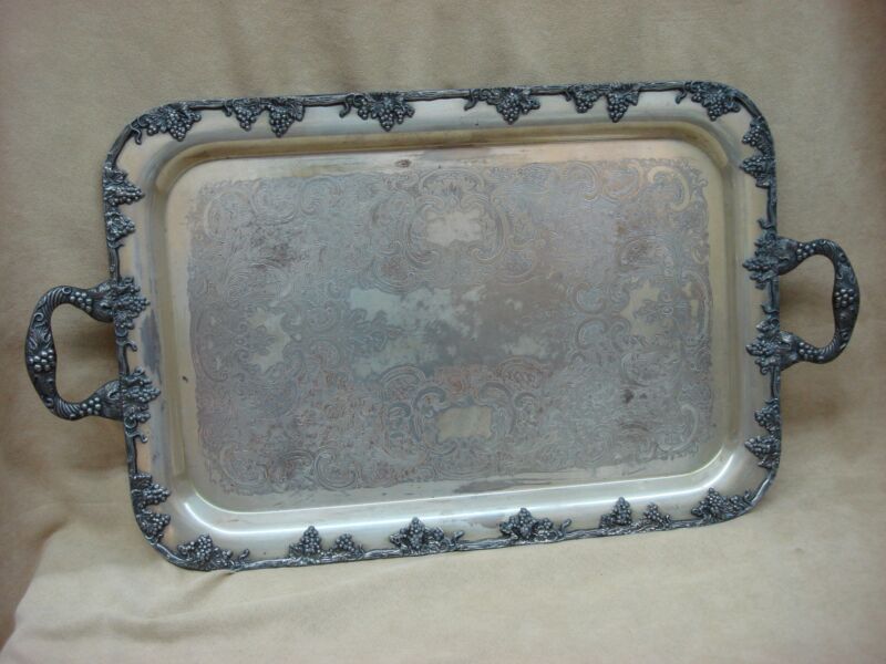 Antique silver plate tray with Rococo floral engravings and copper base