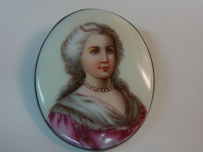 Antique miniature portrait of a woman in a silver frame