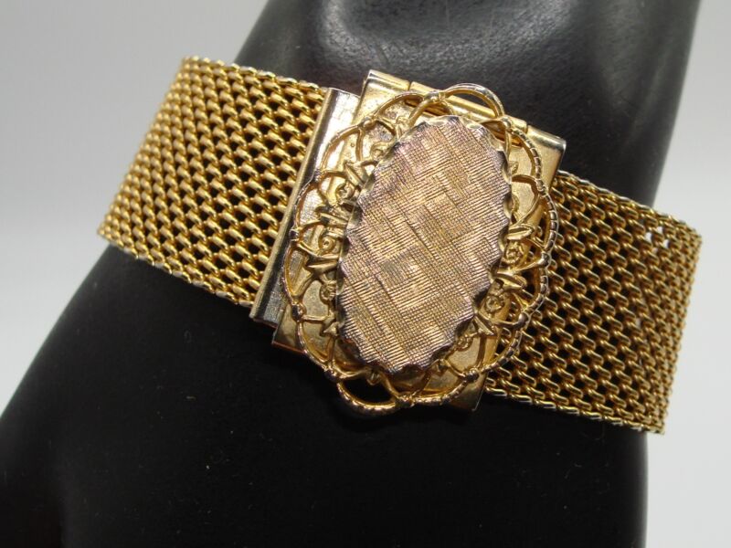 Vintage 1970s gold-tone mesh bracelet with oval scalloped design