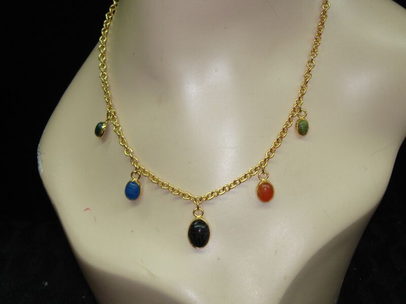 Vintage 1980s gold-tone scarab beetle necklace with onyx and carnelian accents