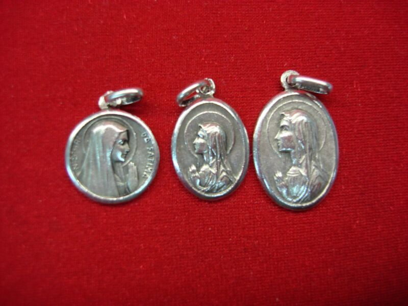 Vintage set of three sterling silver Lady of Fatima medals, different sizes and shapes