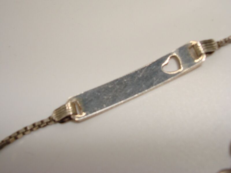 Vintage sterling silver ankle bracelet with open heart design
